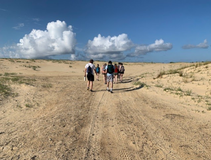 Picture of our field site hiking Jockey's ridge, where we learned about the infamous sand dunes and environmental management.